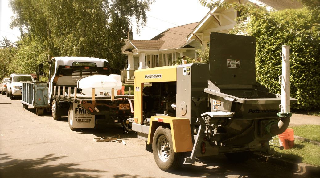 AAA Concrete Pumping truck-mounted line pump on a job site