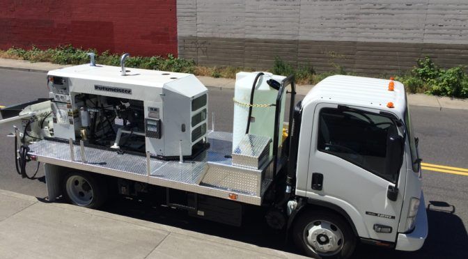 AAA Concrete Pumping truck-mounted line pump on a job site