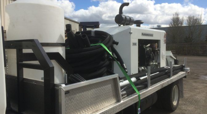 AAA Concrete Pumping truck-mounted line pump on a job site