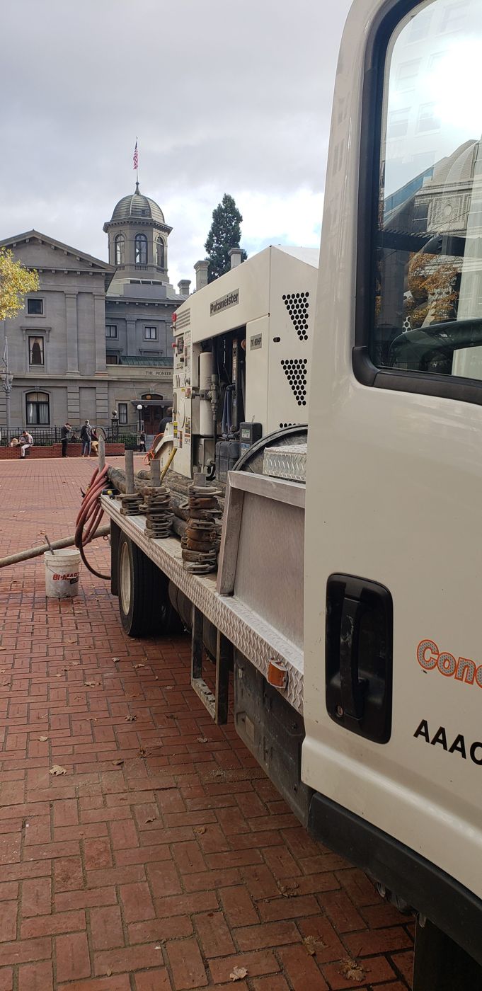 AAA Concrete Pumping truck-mounted line pump on a job site