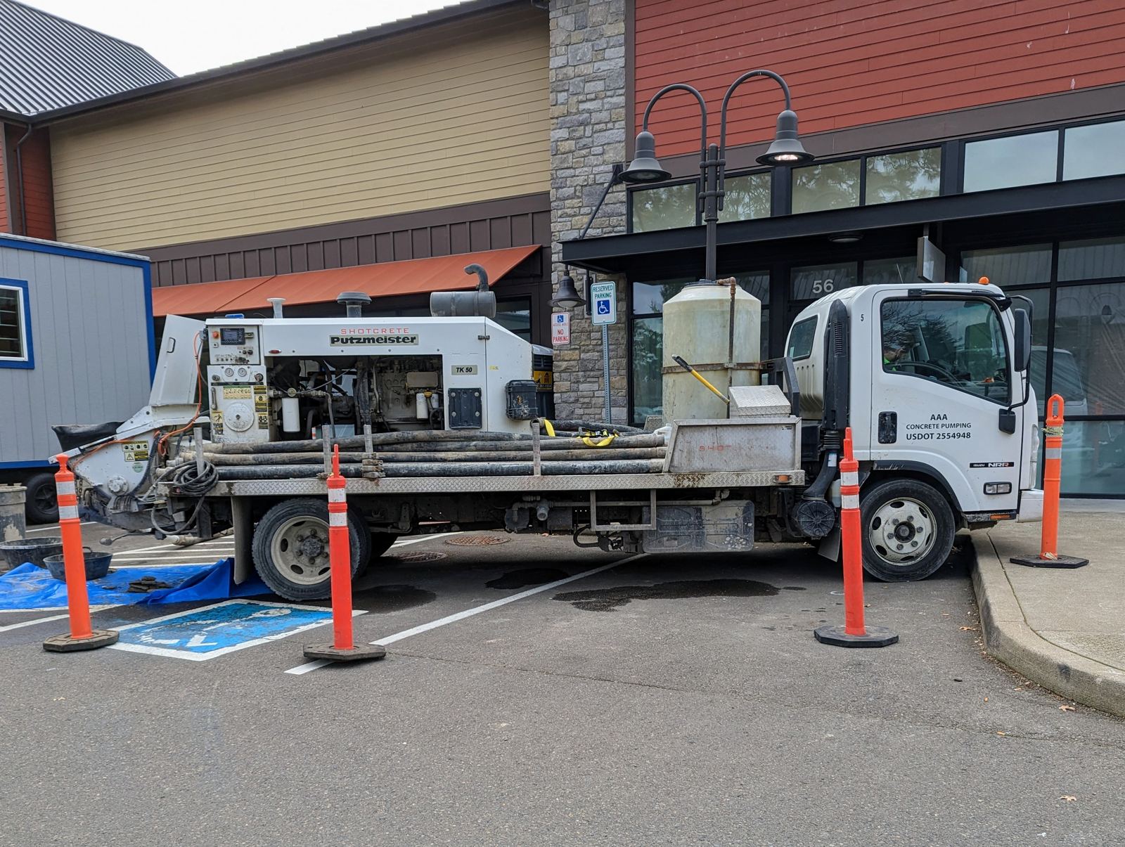 AAA Concrete Pumping truck-mounted line pump on a job site